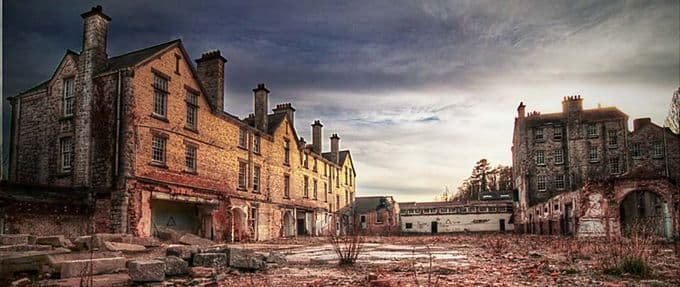 Abandonded asylum at sunset