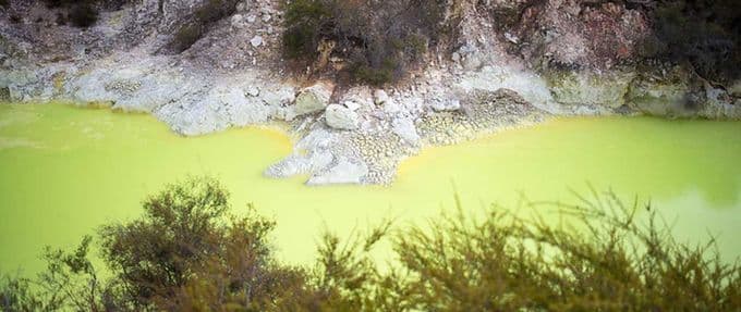 The lime green waters of Devil's Bath, New Zealand