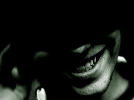 A Sinister Smile: What is “The Grinning Man”?